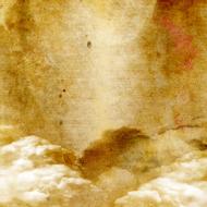 clouds on golden scrapbooking paper background