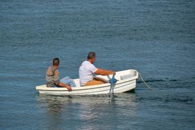 people boat water floating