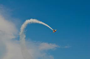 trace airplane cloud sky