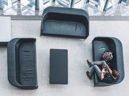 black sofas in the large hall