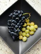 juicy grapes in a bowl