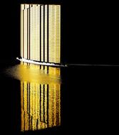 architecture of modern building reflected in water at night