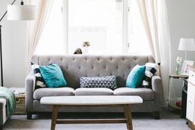 photo of a sofa with pillows in the living room