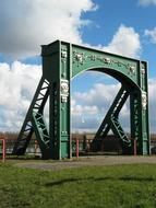 green arch iron landscape