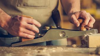 man and wood dust