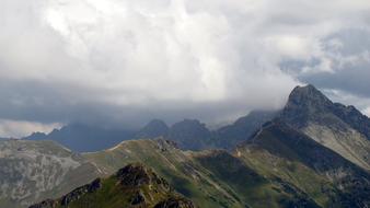 the mountains and clouds are beautiful