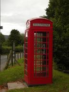 a red letter phone in a green parka