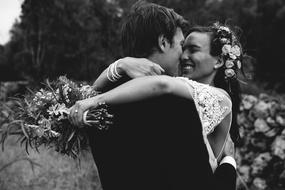 black and white photo of happy newlyweds