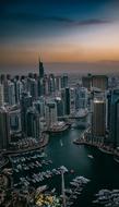 panoramic view of a modern city at cloudy twilight