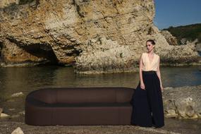 Model shooting of a girl by the river