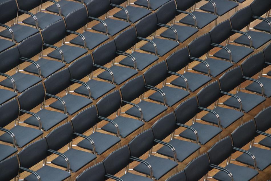 black chairs in the hall