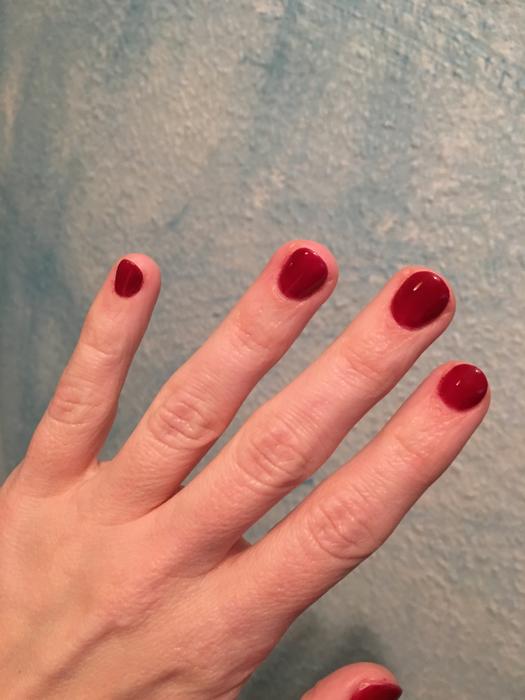 red fingernails on a girl