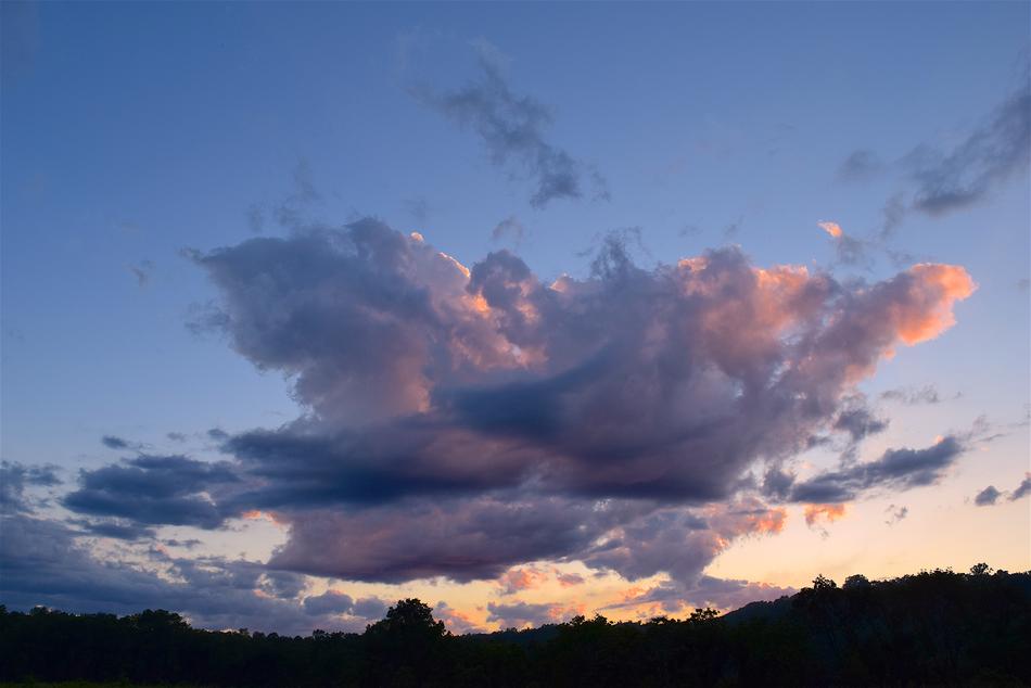 bright clouds over the field