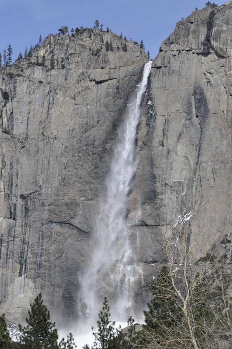 stone wall with a waterfall
