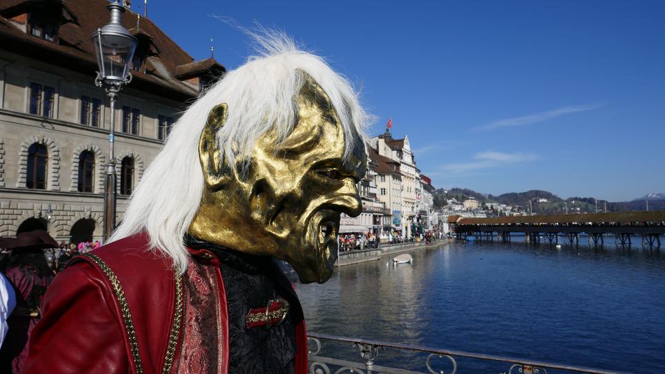 gold mask on a man