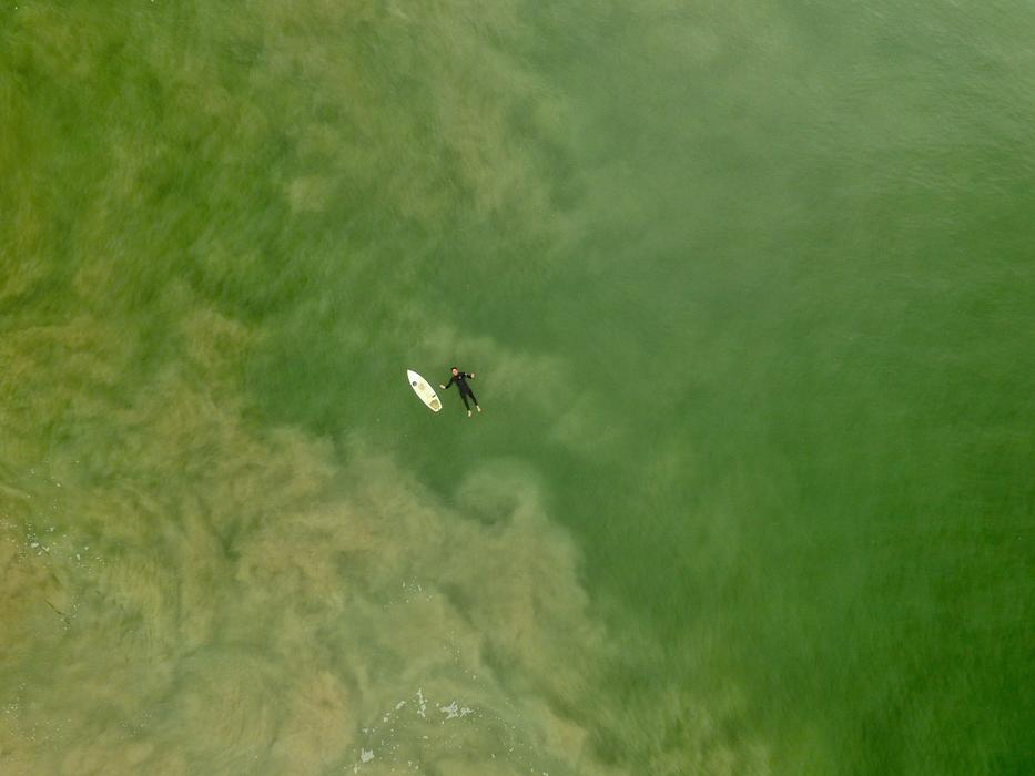 Green Water person surfing