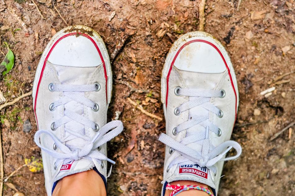white converse sneakers on the ground