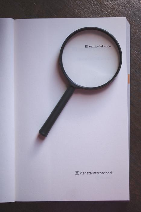 magnifying glass black library paper