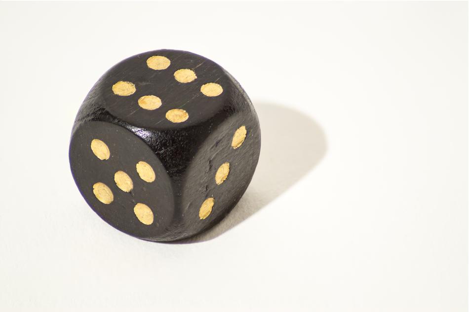 black cube with numbers in yellow