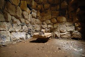 stone wall with man and earth