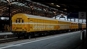 yellow train at the station