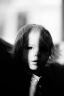 Child face portrait, play of shadows