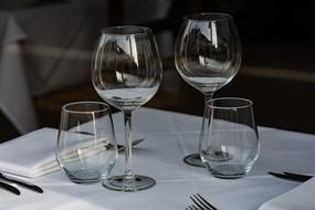 glass tumblers on a white table.