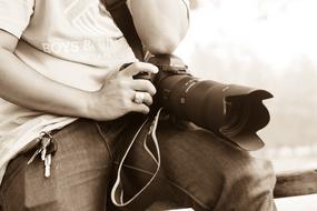 man with camera in monochrome close-up image