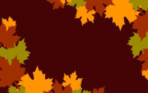 autumn leaves at brown background