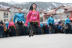 girl dancing with men