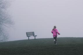 child runs to the bench