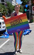 Woman Holding Pride Sign