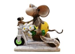 the brown mouse is riding a bicycle