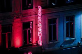 Building red neon sign