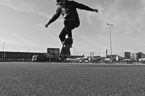 Boy Skating black and white