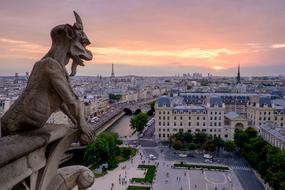 statue on roof on Architecture Building