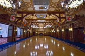 Beautiful architecture of the hall with lights reflections in the floor