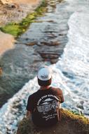man over a cliff