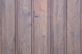 wooden planks on the fence