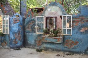 blue walls of a destroyed building
