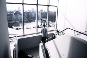 man on Stairway in building