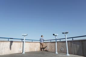 Guy Looking rooftop