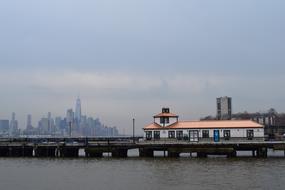Beautiful and colorful dock of Hoboken and Manhattan, USA, under the sky with clouds
