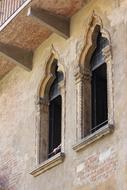 photo of two windows in the old building