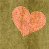 pink heart at green background