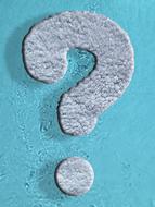 grey Question mark at blue background