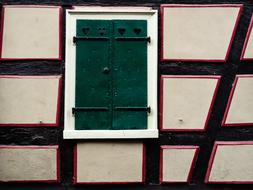Truss Historically green door
