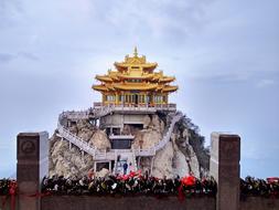 photo of a Buddhist temple on the mountain