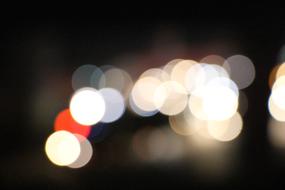 Colorful bokeh lights in the city, at the night