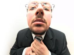 nervousness man in Tie Suit and glasses